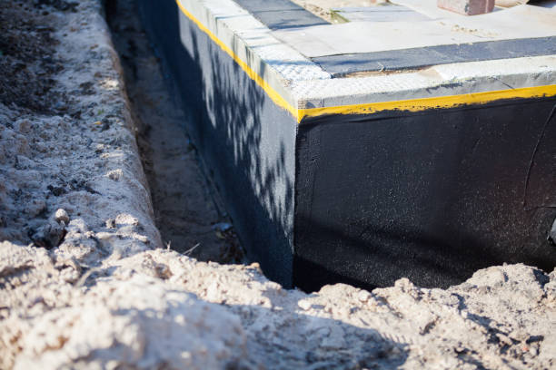 Professional Waterproofing technician working in Lockport, IL